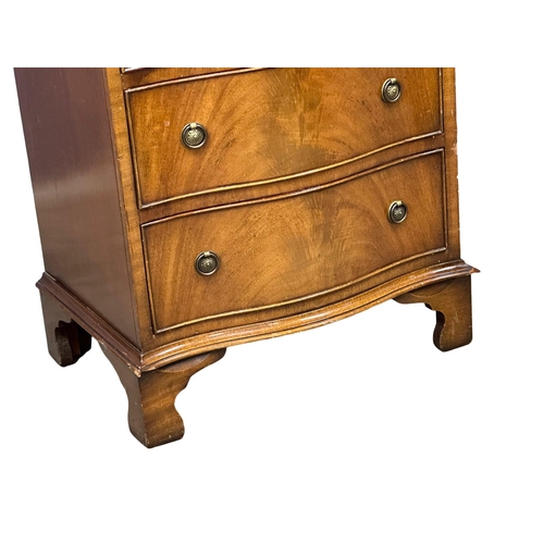 889 - A George III style mahogany serpentine front tallboy chest of drawers. 58x41x131cm (4)