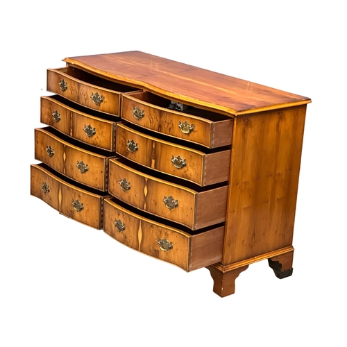 892 - A Georgian style Yew Wood serpentine front chest of drawers on bracket feet. 119x48x82cm (4)