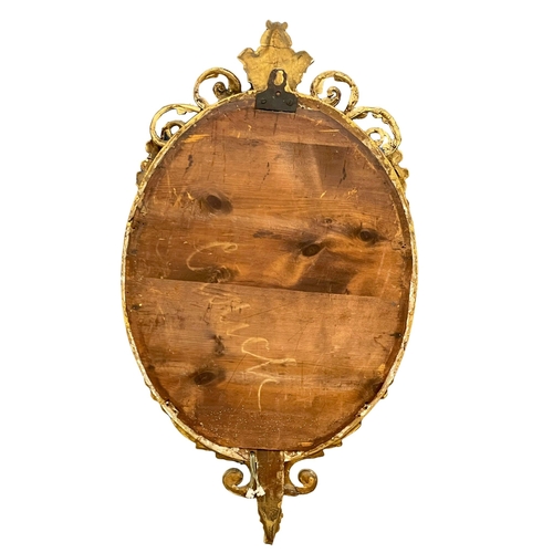 896 - An early 19th century Regency period gilt framed Girandole mirror. 55x101cm