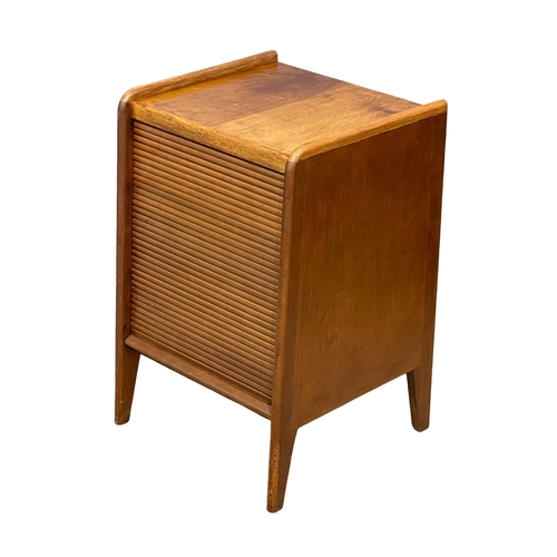 898 - A Mid Century walnut record cabinet with sliding tambour door. 1950-1960. 45x38x67cm (2)