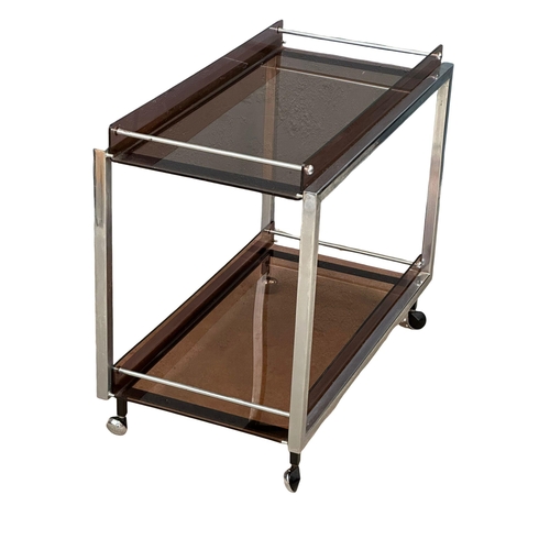 899 - A Mid Century 2 tier chrome serving trolley with smoked purple lucite tops. By Durlston Designs LTD.... 