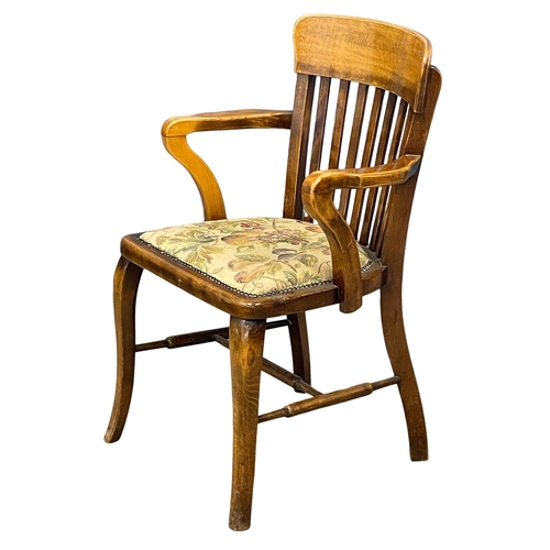 901 - An Edwardian desk chair. (10)