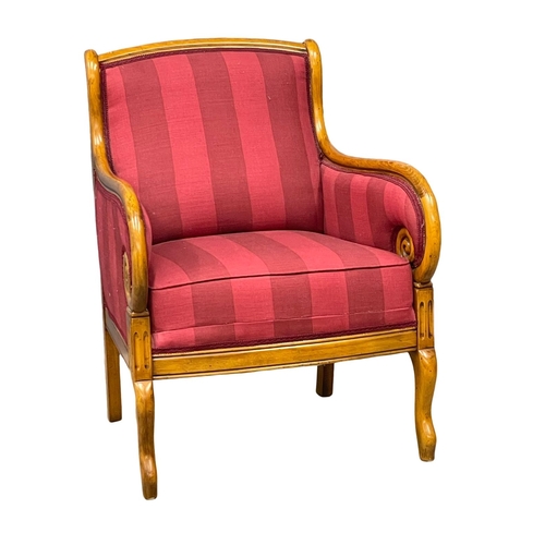 903 - A Regency style armchair. (2)