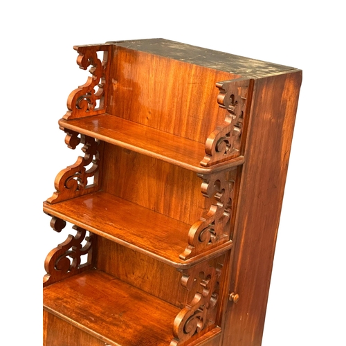 908 - A Victorian mahogany dining room leaf cabinet with 3 tier shelves and cupboard. Circa 1860. 60.5x60x... 