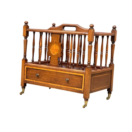 915 - A good quality Georgian style inlaid mahogany Canterbury with drawer on brass cup casters. 56x36x53c... 