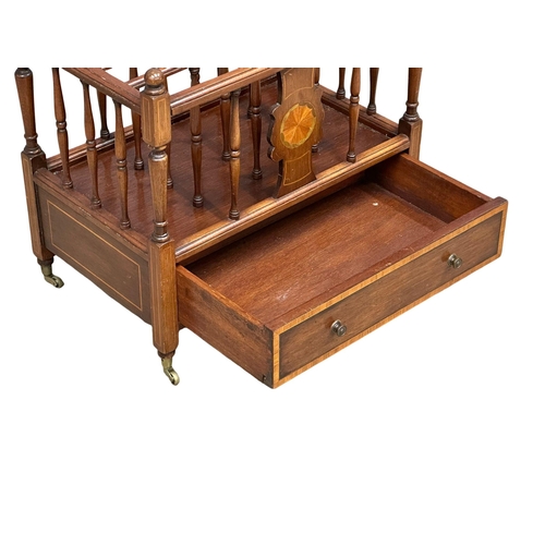 915 - A good quality Georgian style inlaid mahogany Canterbury with drawer on brass cup casters. 56x36x53c... 