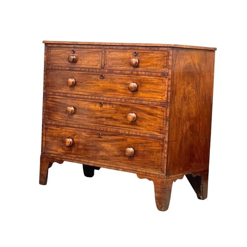 921 - A good quality George IV inlaid mahogany chest of drawers, with original Bun Handles on splayed brac... 