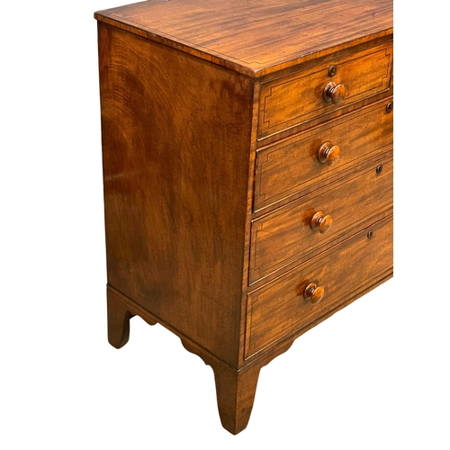 921 - A good quality George IV inlaid mahogany chest of drawers, with original Bun Handles on splayed brac... 