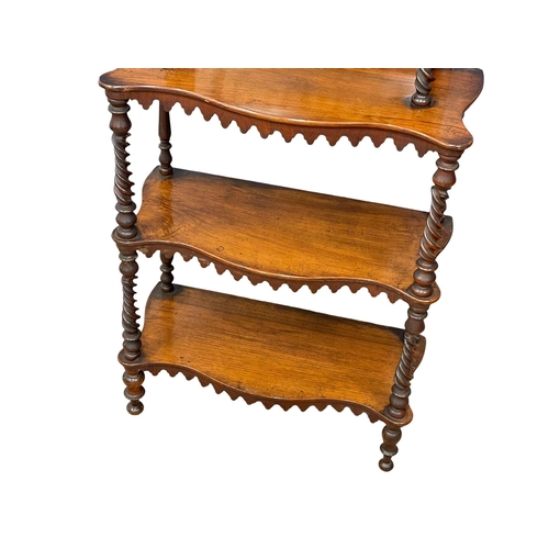 923 - A Victorian mahogany 6 tier mirror back whatnot shelving unit with Barley Twist supports. 66x30x155c... 