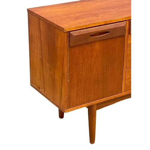 924 - A 1960’s Mid Century teak sideboard by Wright & Newton. 182x42x76cm (2)