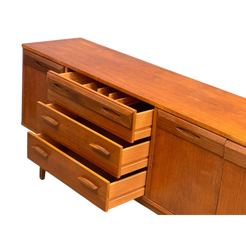 924 - A 1960’s Mid Century teak sideboard by Wright & Newton. 182x42x76cm (2)