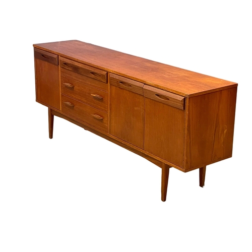 924 - A 1960’s Mid Century teak sideboard by Wright & Newton. 182x42x76cm (2)