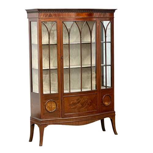 926 - A large Edwardian mahogany bow front display cabinet on splayed feet. 122x42x175.5cm (6)