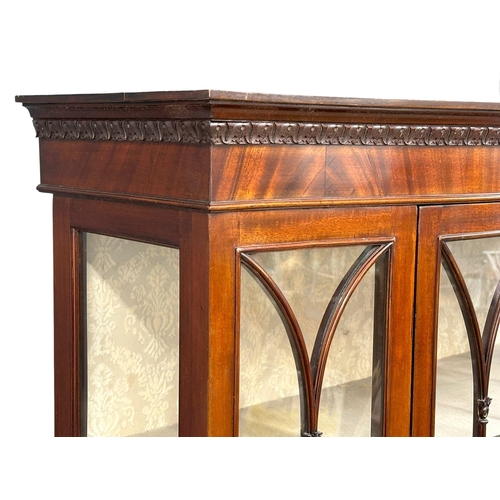 926 - A large Edwardian mahogany bow front display cabinet on splayed feet. 122x42x175.5cm (6)