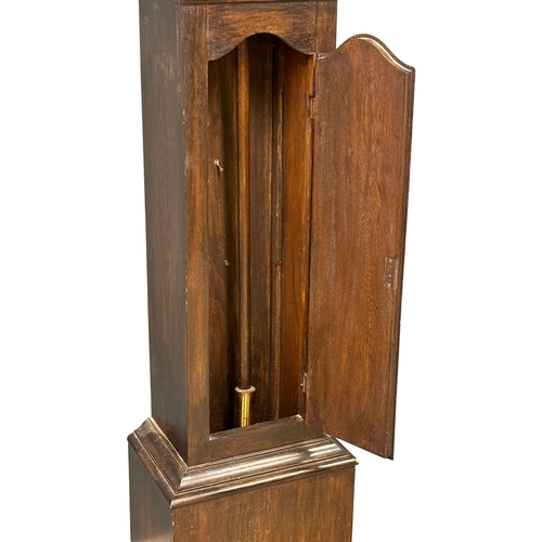 928 - An early 20th century oak long case clock with brass and pendulum. 197cm (4)