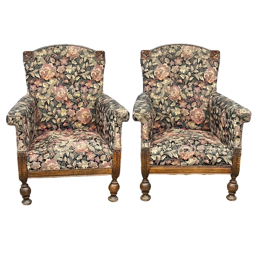 931 - A pair of early 20th century oak framed country house armchairs, circa 1920s. 74x68x88cm (13)