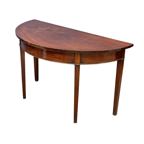 932 - A George III mahogany Demi Lune console table. 122x60x71cm (1)