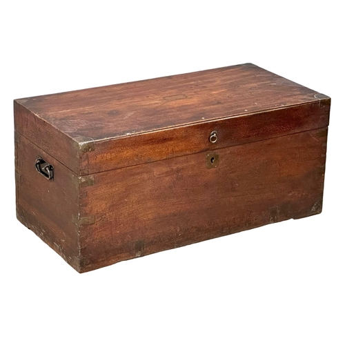 94 - A Victorian camphorwood campaign trunk. 84x41x38cm