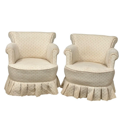 940 - A pair of vintage tub chairs. (6)