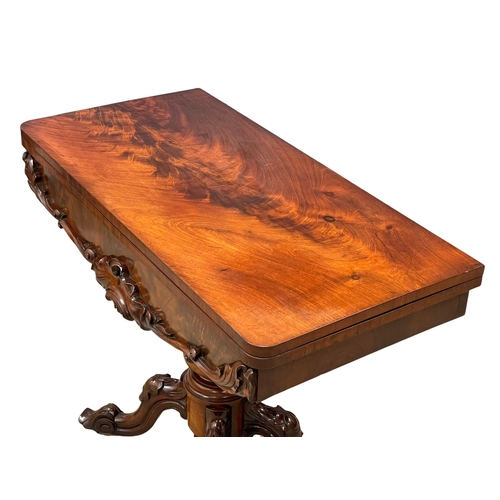 947 - A good quality early Victorian mahogany turnover tea table. Circa 1840. 96x47.5x75cm (2)