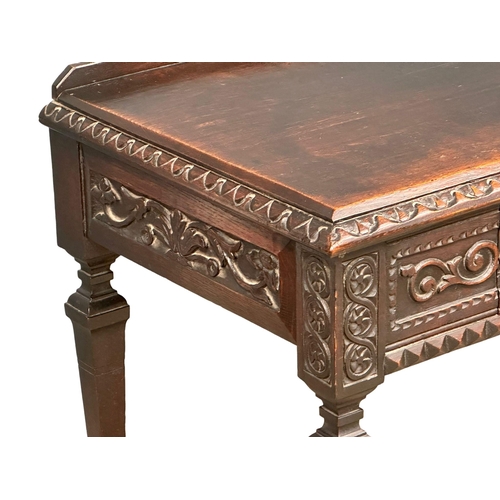 953 - A Victorian carved oak hall table with drawer. Circa 1880. 86x54x82cm (6)