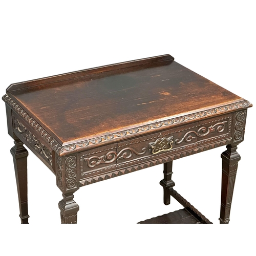 953 - A Victorian carved oak hall table with drawer. Circa 1880. 86x54x82cm (6)