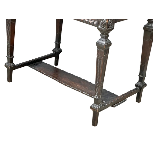 953 - A Victorian carved oak hall table with drawer. Circa 1880. 86x54x82cm (6)