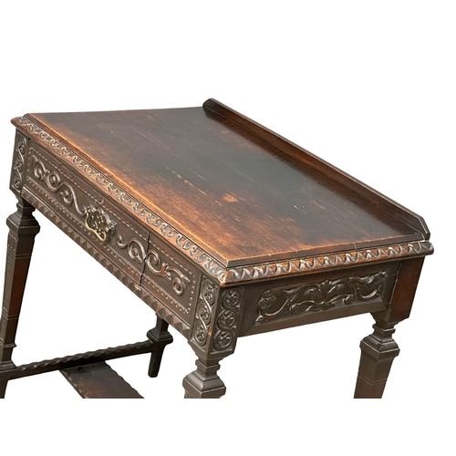 953 - A Victorian carved oak hall table with drawer. Circa 1880. 86x54x82cm (6)