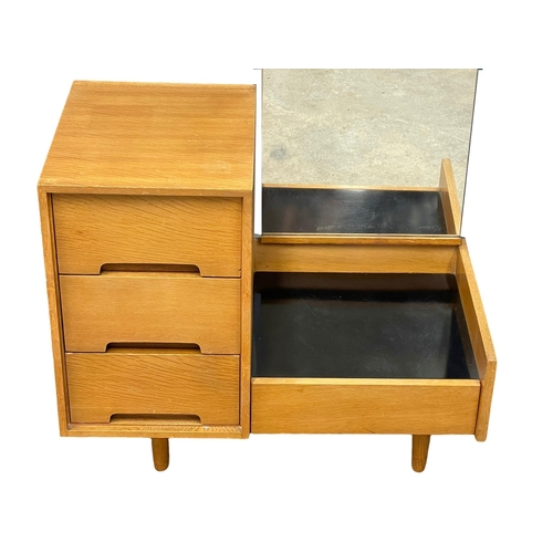 955 - A Mid Century oak ‘C Range’ dressing table designed by John & Sylvia Reid for Stag. 1960. 86x45x161c... 