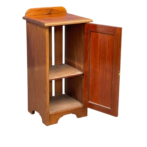 963 - An Edwardian walnut bedside cabinet. 37x34x77cm (2)