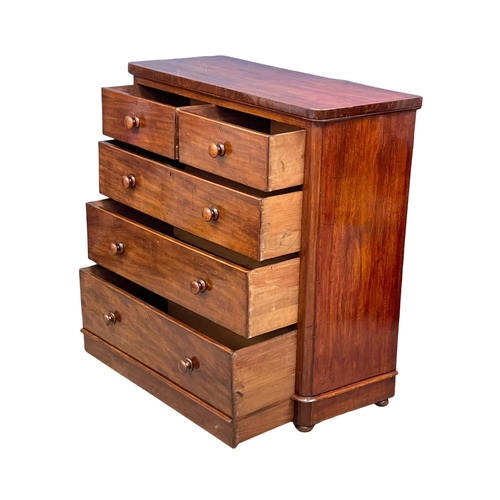 966 - A large Victorian mahogany chest of drawers with bun handles. 117x51x118cm (2)