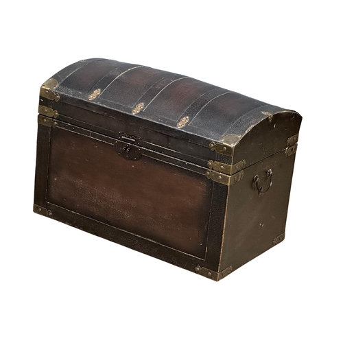 98 - A 19th century style leather brass bound trunk. 71x40x47cm