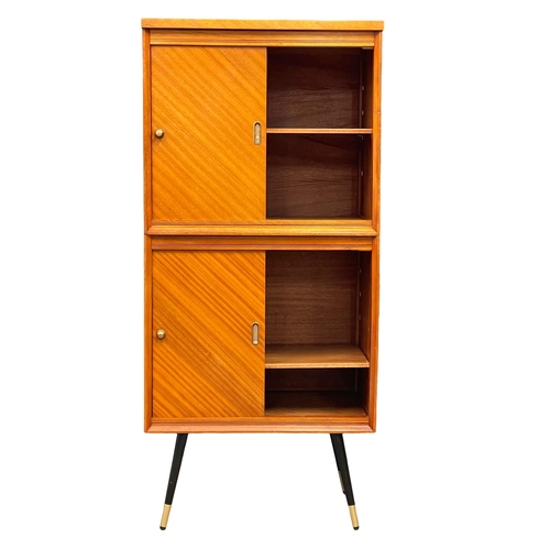 980 - A large Mid Century teak record cabinet. 66x51x145cm (3)