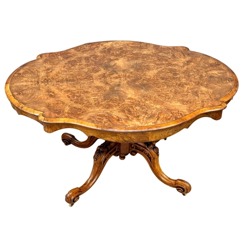 989A - A good quality Victorian Burr Walnut tilt top pedestal breakfast table / dining table on cabriole le... 