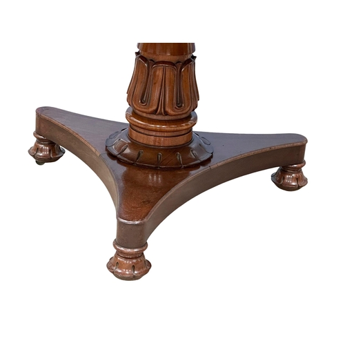 990 - A William IV mahogany tilt top pedestal breakfast table/dining table. 125x77cm (5)