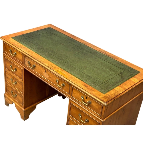 991 - A vintage Georgian style Yew Wood pedestal writing desk with leather top. 122x61x79cm (4)