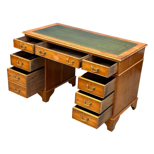 991 - A vintage Georgian style Yew Wood pedestal writing desk with leather top. 122x61x79cm (4)