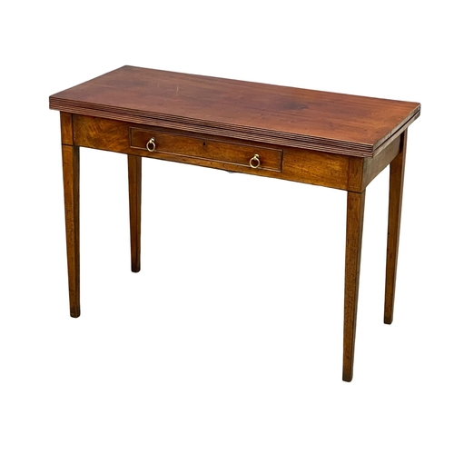 998 - A George III inlaid mahogany turnover tea table with drawer. Circa 1800 106.5x48x77cm (3)