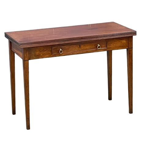 998 - A George III inlaid mahogany turnover tea table with drawer. Circa 1800 106.5x48x77cm (3)