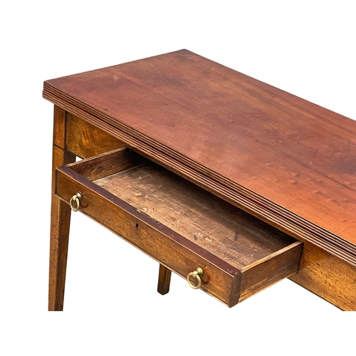 998 - A George III inlaid mahogany turnover tea table with drawer. Circa 1800 106.5x48x77cm (3)