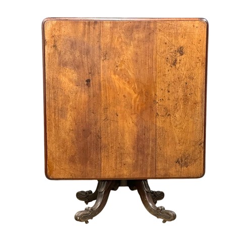 969 - A George IV mahogany pedestal tilt top breakfast table/dining table. Circa 1820. 125x123x77cm (7)