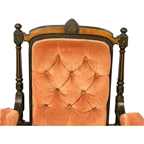 1169 - A Victorian Burr Walnut and Ebonised ladies button back armchair.