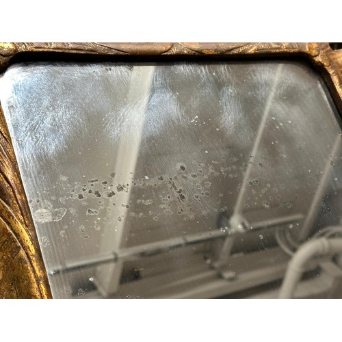 806 - A George III gilt framed wall mirror. Circa 1790-1810. 60.5x96cm