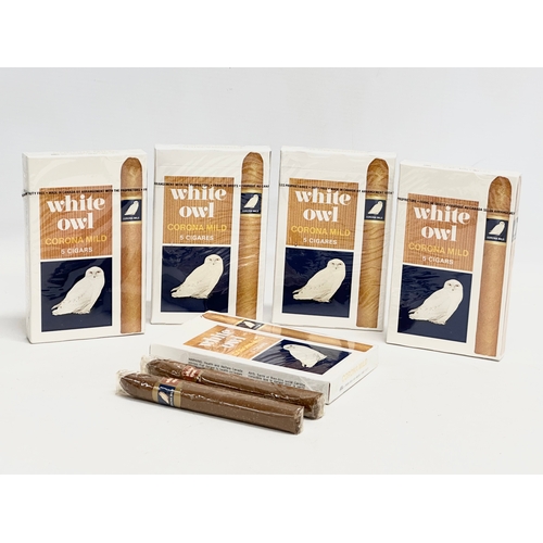 67 - A collection of White Owl Corona Mild cigars. 4 packets unopened. 1 open.