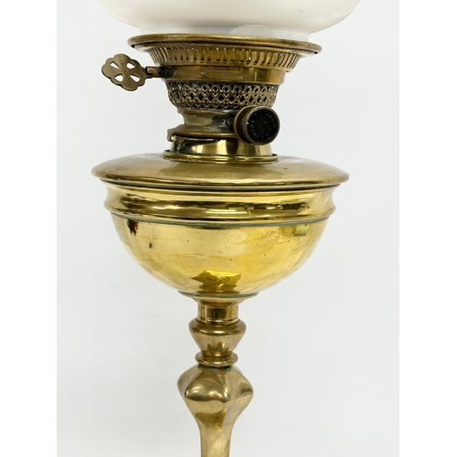 1 - A good quality late Victorian brass oil lamp by Evered & Co LTD, London. With later shade. 65cm