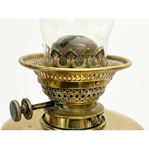 1 - A good quality late Victorian brass oil lamp by Evered & Co LTD, London. With later shade. 65cm