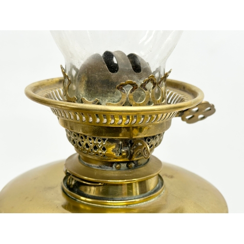 1 - A good quality late Victorian brass oil lamp by Evered & Co LTD, London. With later shade. 65cm