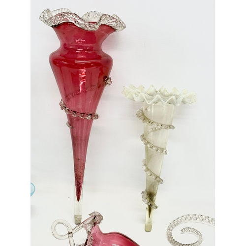 4 - A Victorian epergne and parts. A pair of Victorian Cranberry and Vaseline Glass epergne branches 30c... 