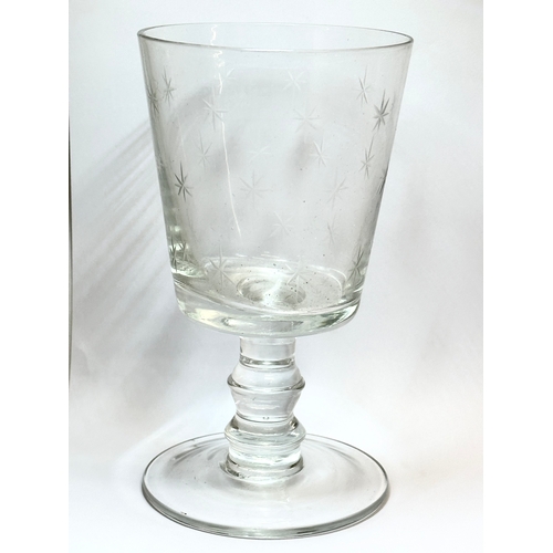 48 - A collection of early 20th century drinking glasses. A George III style gin glass, circa 1920. 3 lat... 