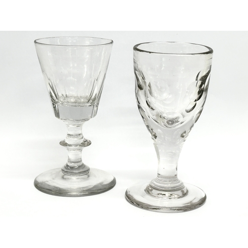 48 - A collection of early 20th century drinking glasses. A George III style gin glass, circa 1920. 3 lat... 